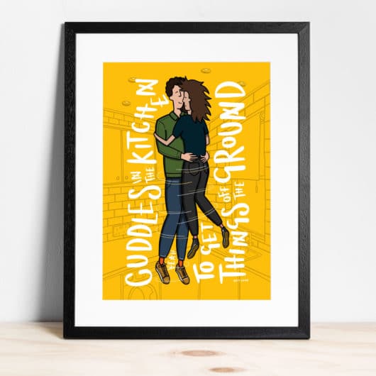 Cuddles in the kitchen framed print
